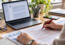 office, desk, document review, editing, laptop, paperwork, productivity, proofreading, critical thinking, technology, red pen, document, workspace, artificial intelligence, people, green plant, business environment, handwritten notes, data analysis, human oversight role